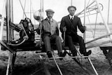Black and white old photo of Wilbur and Orville wright on flyer I. 1910.