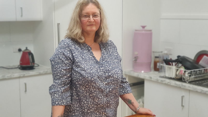 a woman in her kitchen