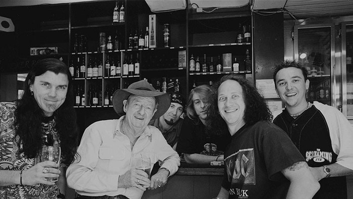 Slim Dusty pictured with the Screaming Jets at a pub in the 1990s.