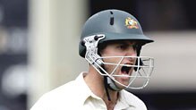 Simon Katich shows his frustration at being given out lbw.