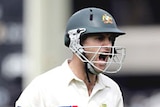 Simon Katich shows his frustration at being given out lbw.