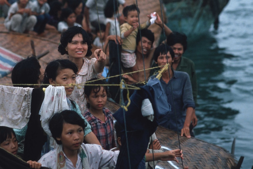 Vietnamese boat refugees arrive in Hong Kong.