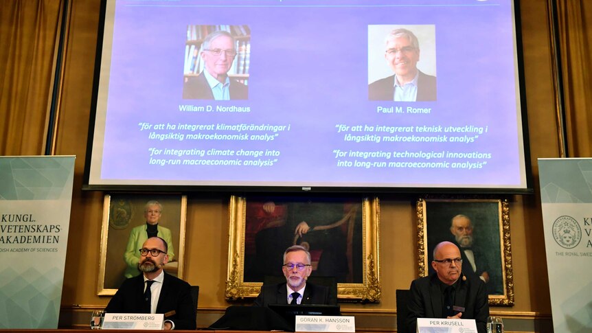 Screen showing laureates of the Nobel Prize in Economics.