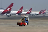 Qantas planes sit at Sydney Airport