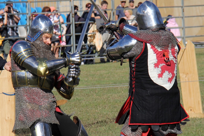 Sword skills on display in the jousting arena at the Abbey Medieval Festival in Caboolture on July 7, 2012.