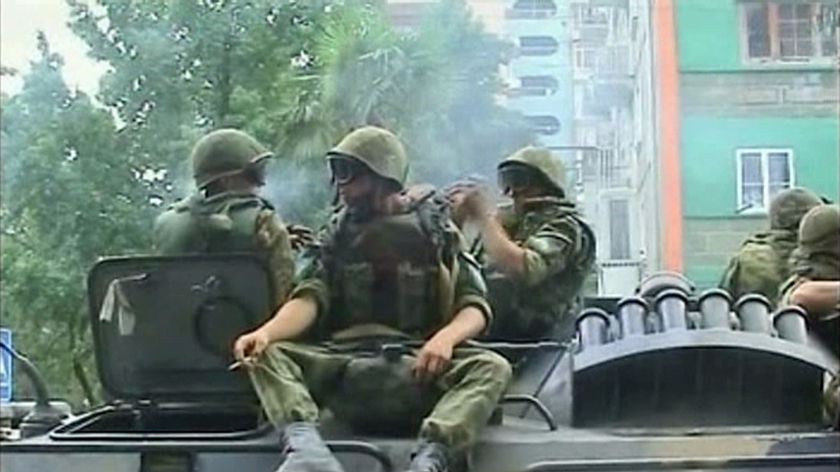 The troops appear to be moving back through the city towards South Ossetia.
