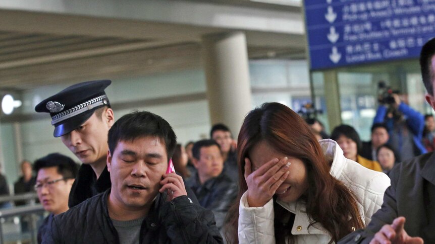 Relatives of Malaysia Airlines passenger at Beijing airport
