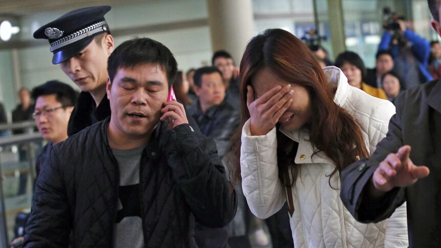 Relatives of Malaysia Airlines passenger at Beijing airport