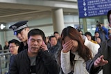 Relatives of Malaysia Airlines passenger at Beijing airport