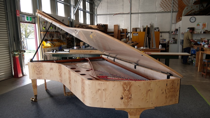 The world's first 108 key 9 octave grand piano from behind
