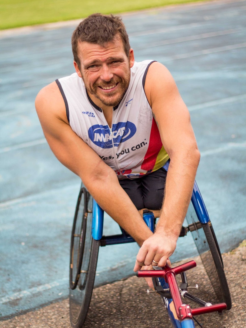 Kurt Fearnely sits in his wheelchair.