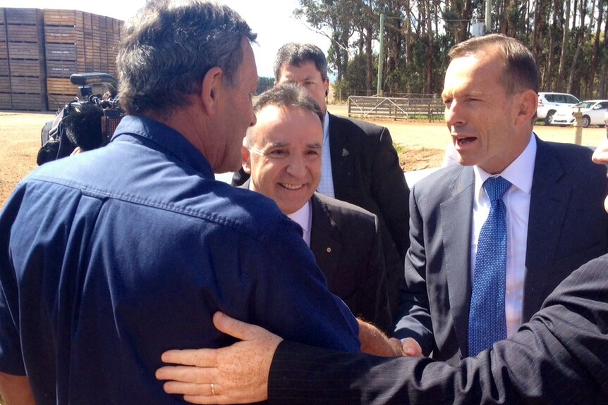 Prime Minister Tony Abbott meets onion farmer