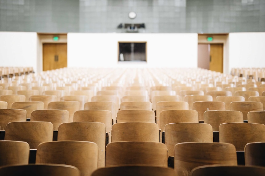 An empty university lecture hall.