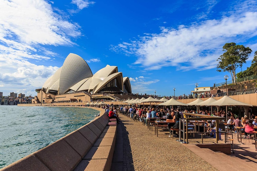 An image of what the Sydney Opera House would look like if two degrees of global warming is locked in, with water lapping at the rim of the breakwater.