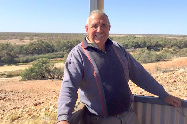 Diamantina shire mayor and grazier Geoff Morton standing on his outdoor area which overlooks the Diamantina.