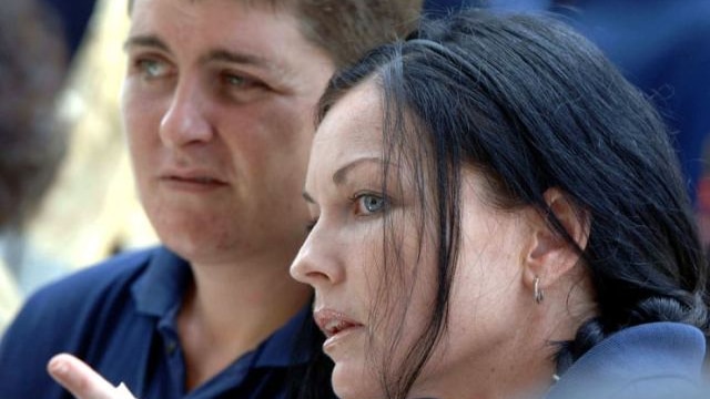 Schapelle Corby (R) and Renae Lawrence (L) sit together.