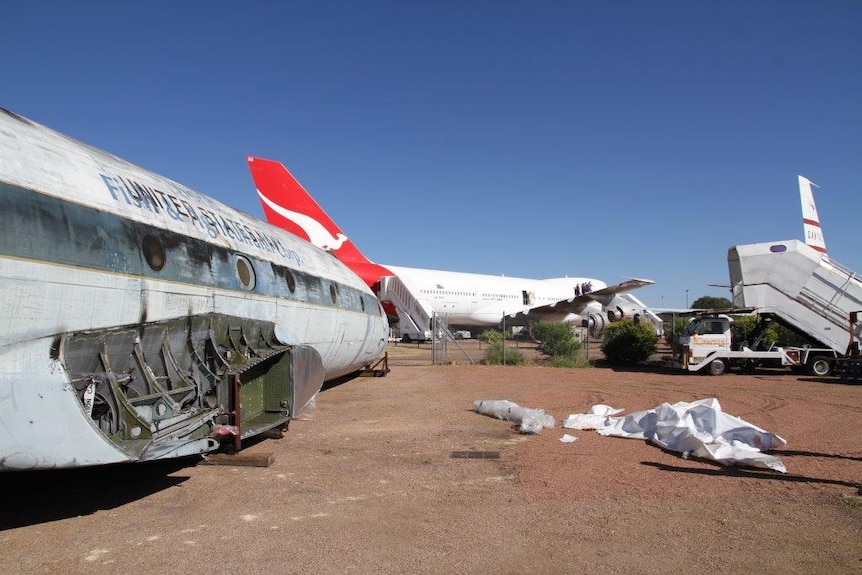The Super Constellation and the Boeing 747 on display for crowds at the Qantas Founders Museum in Longreach