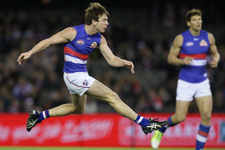 Liam Picken kicks a goal for the Western Bulldogs against St Kilda at Docklands.
