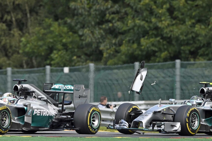 Rosberg's front wing made contact with Hamilton's rear tyre and punctured it.