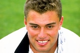 Heath Davis of New Zealand poses for a photo in his team tracksuit