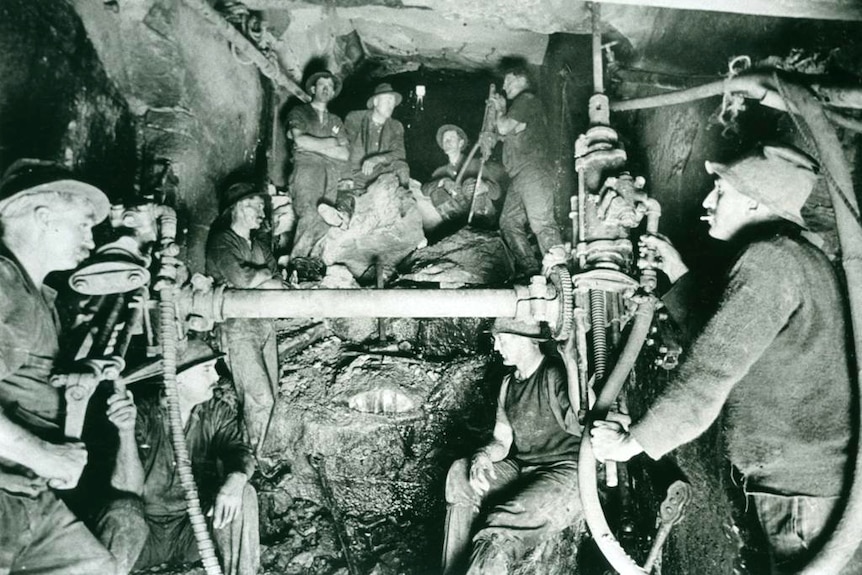 The men broke through and saw the light of the Long Nose Point end of the tunnel under Sydney Harbour in 1922.