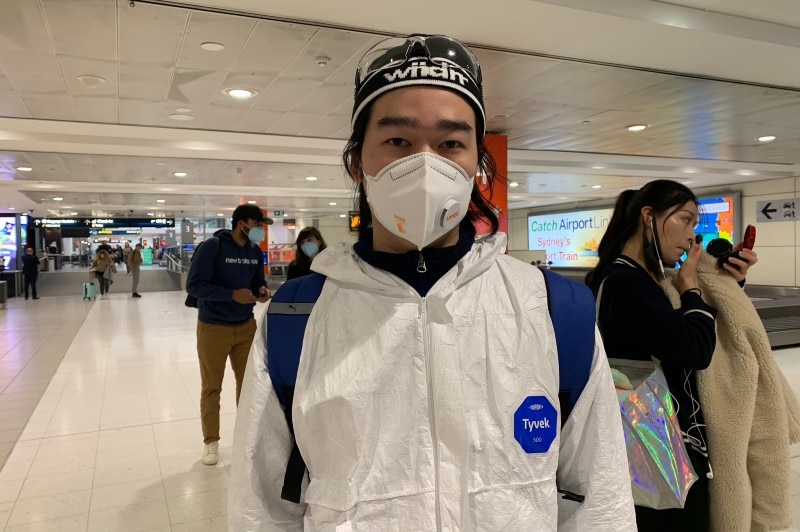 A man in full protective gear at Sydney Airport.