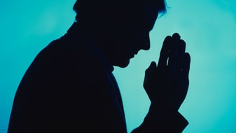 File photo: Silhouette of a man praying (Thinkstock: Stockbyte)