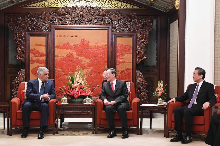 Dominican Republic's Miguel Vargas, left, in a meeting with Chinese Vice President Wang Qishan and Wang Yi.