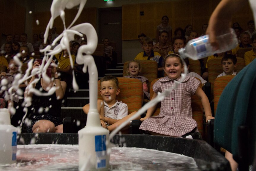 Students watch an explosion experiment