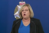 Victorian Emergency Services Minister Lisa Neville speaks at a police press conference.