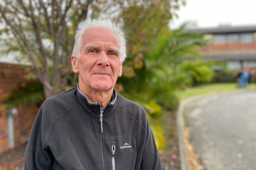 Poppy Growers Tasmania chief executive Keith Rice standing outside