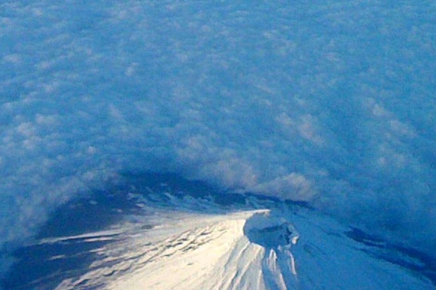 Mt Fuji rises out of the cloud