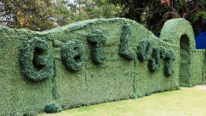 Green hedge entrance to the Get Lost maze at Perth Fringe World