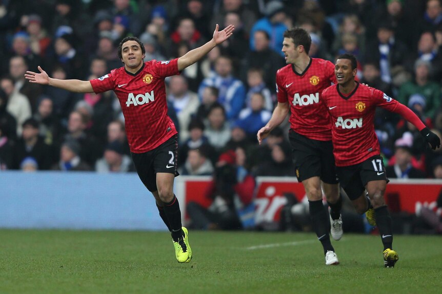 Rafael of Manchester United celebrates scoring
