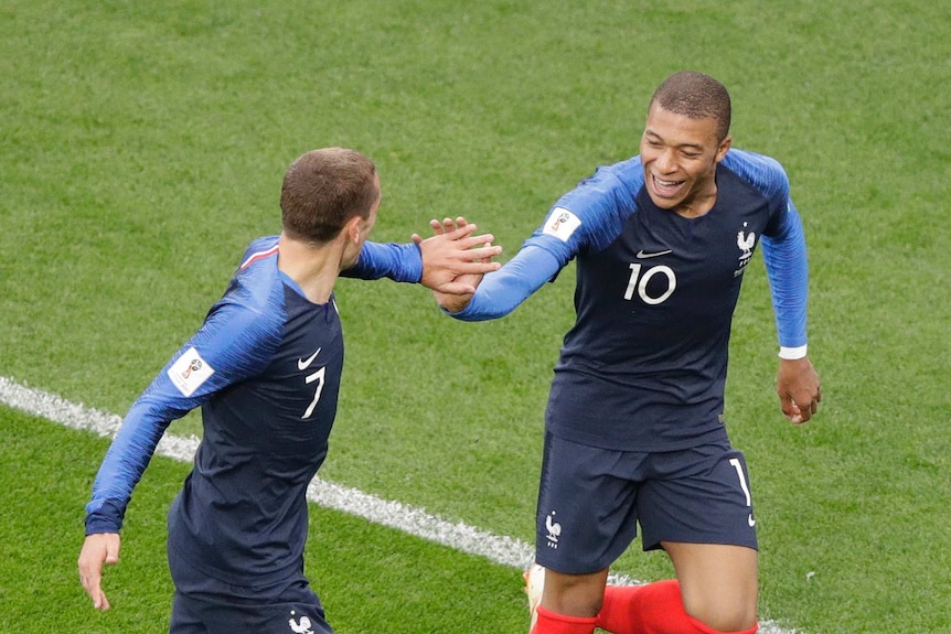 Kylian Mbappe and Antoine Griezmann are happy