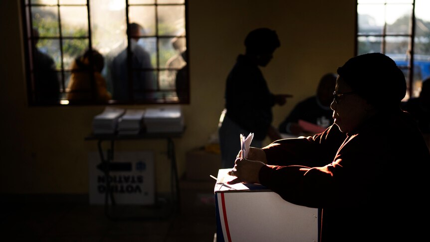 Woman casts ballot in South African election