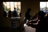 Woman casts ballot in South African election