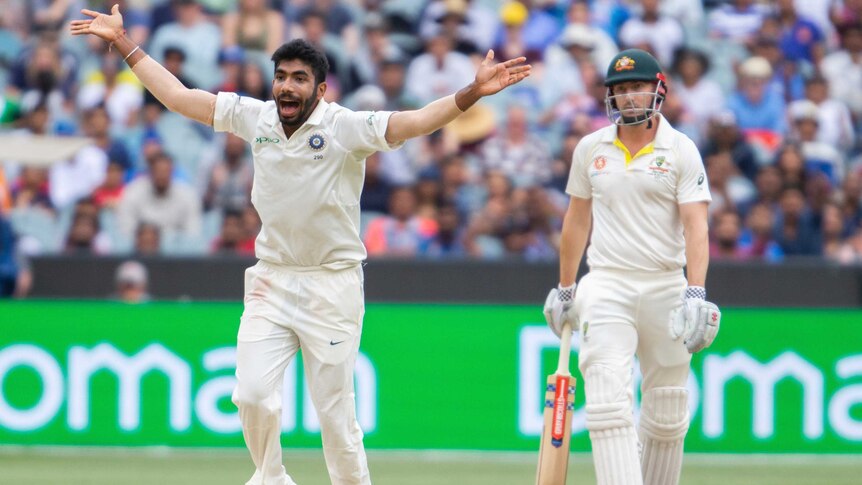 Jasprit Bumrah appeals for the wicket of Shaun Marsh
