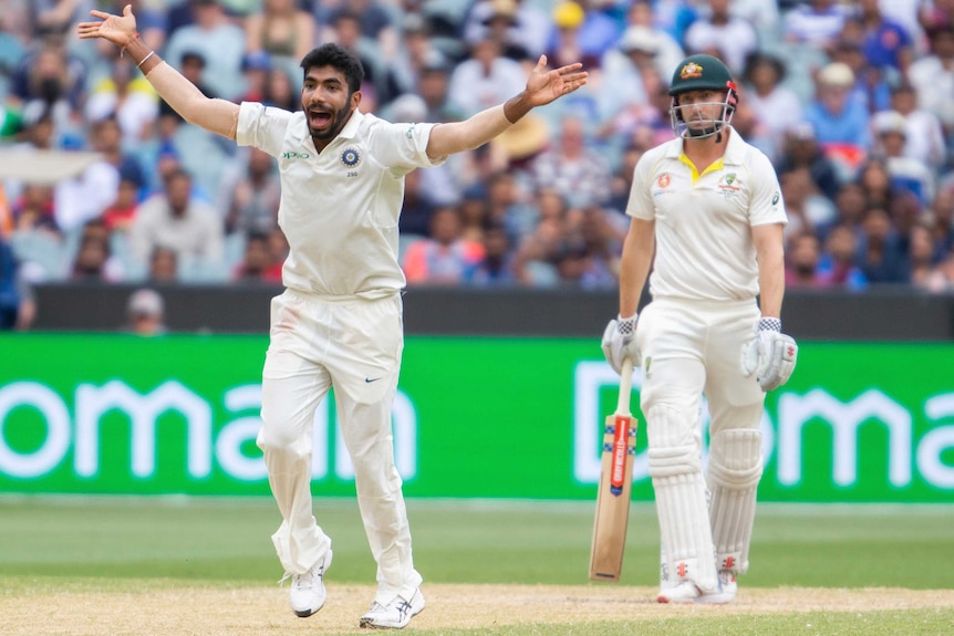 Jasprit Bumrah appeals for the wicket of Shaun Marsh