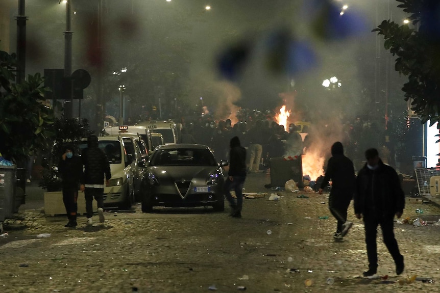 People protest in Naples