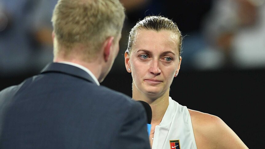 Petra Kvitova crying during a post-match interview.