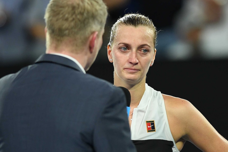 Petra Kvitova crying during a post-match interview.