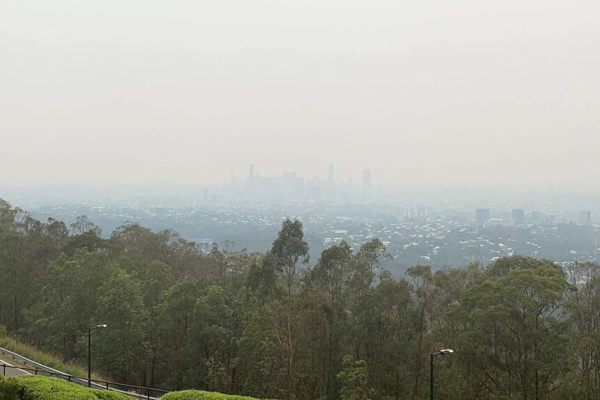 Smoke blankets Brisbane CBD seen from Mt Coot-tha.