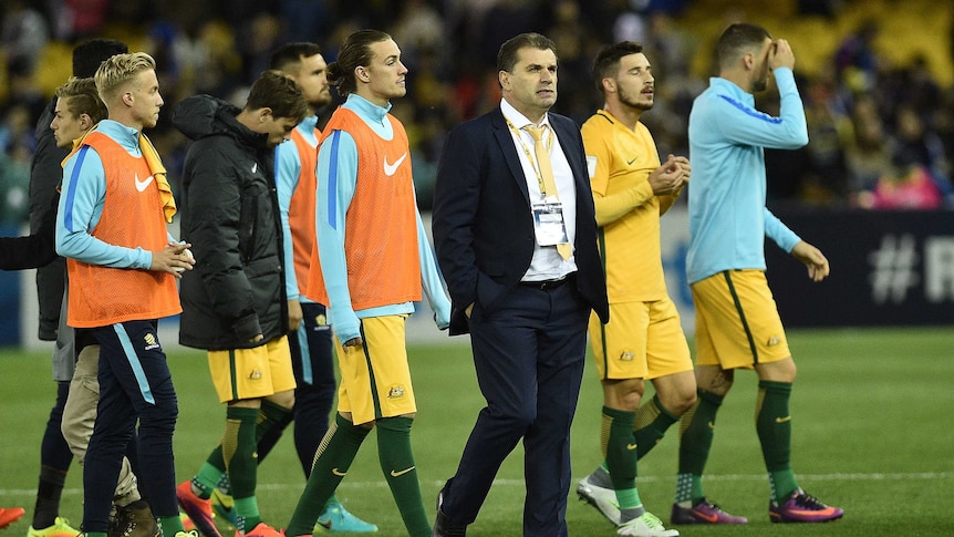 Ange Postecoglou and the Socceroos after a World Cup qualifier against Japan