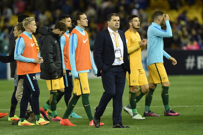 Ange Postecoglou and the Socceroos after a World Cup qualifier against Japan