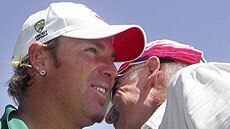 Shane Warne chats with Dennis Lillee after breaking his record in Perth
