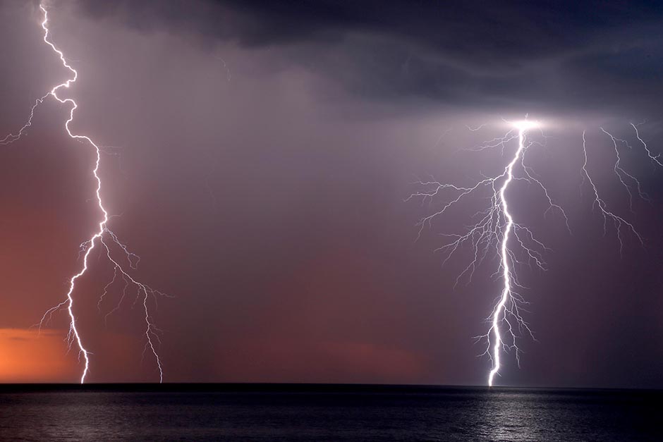 Lightning strikes the water off Hallett Cove.