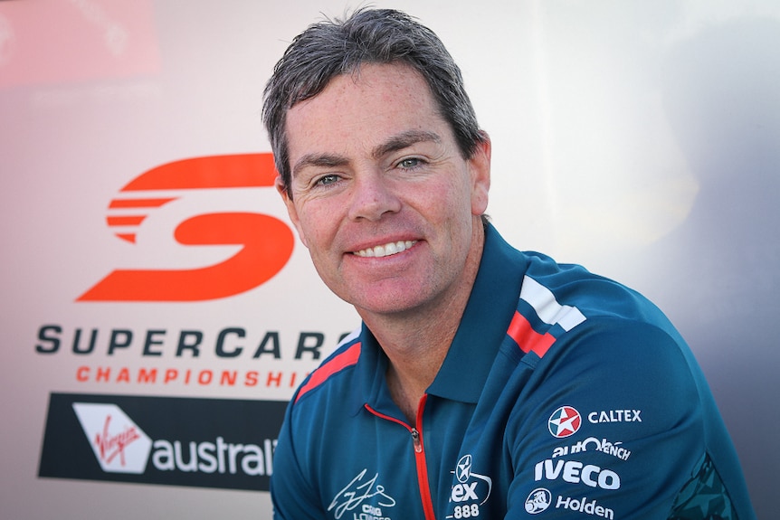 Mid-shot of racing car driver Craig Lowndes, smiling.