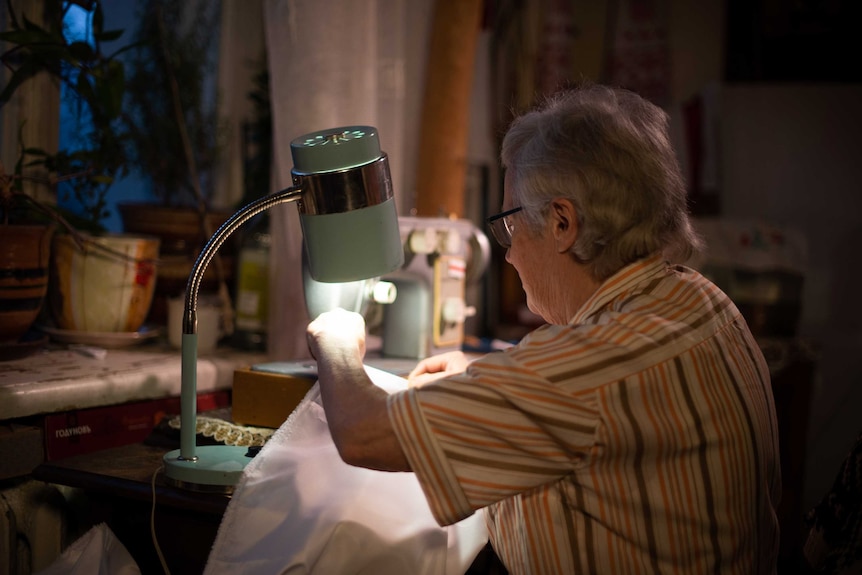 Nina sewing.