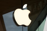 An Apple company logo on a storefront